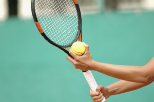 Tennis Player Preparing to Serve